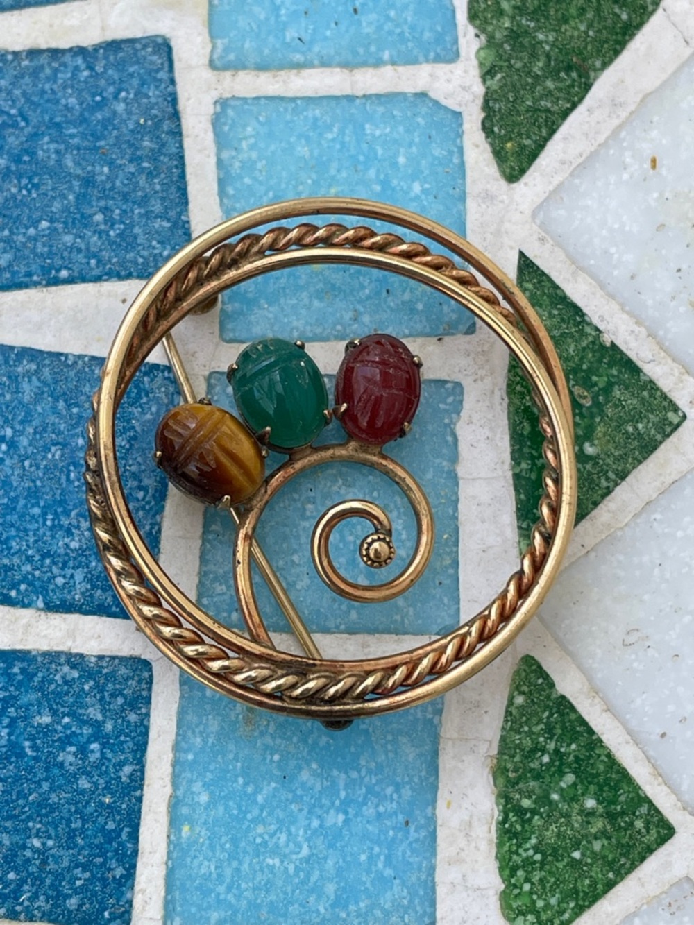 Gold-Tone Floral Brooch with Red, Green & Brown Cabochons